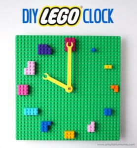 green lego clock with yellow hands