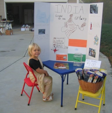 Elleina in a sari with her missionary project about India